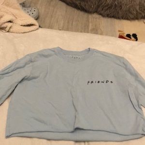 blue cropped friends long sleeve shirt